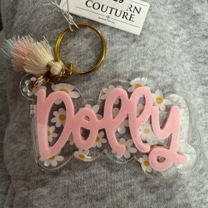 Dolly acrylic key or bag charm NWT